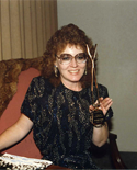 Debby Delmore holding trophy